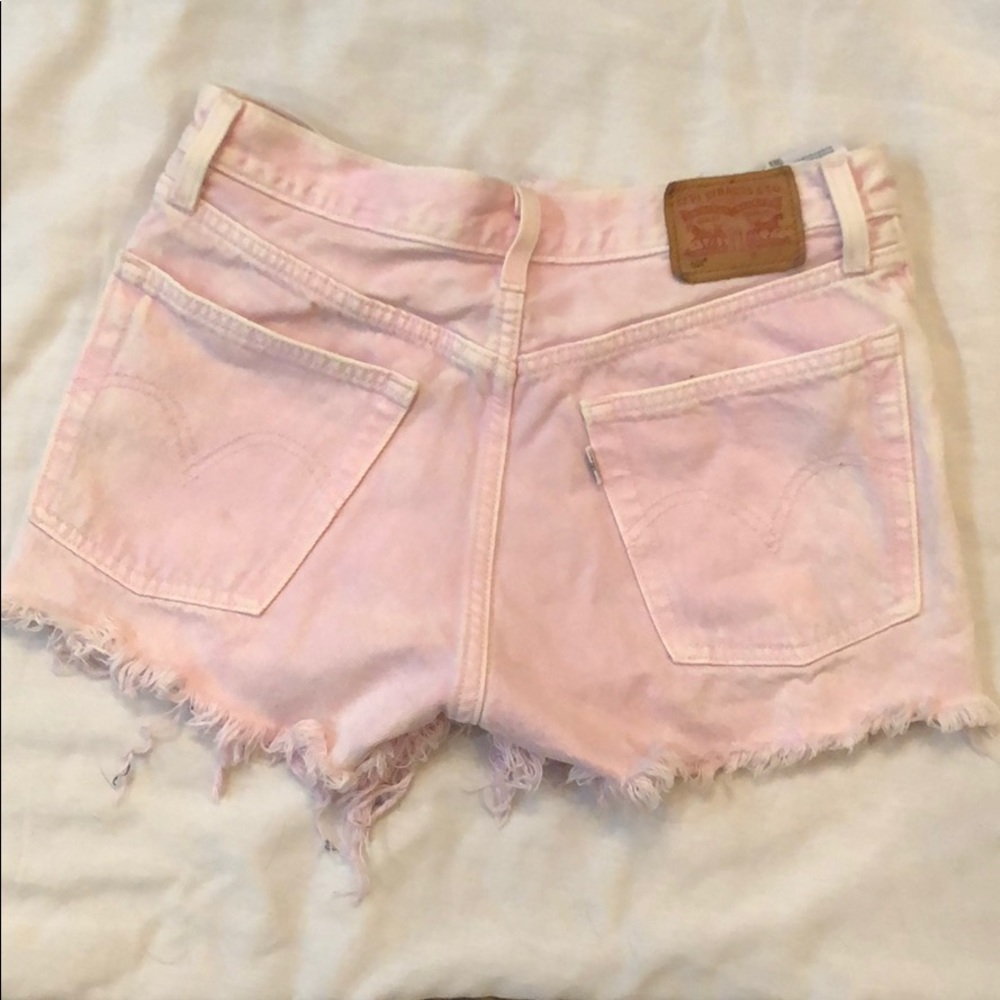 Light pink Levi’s shorts